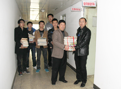 我院响应区政府号召向基层建设年活动帮扶村捐赠图书